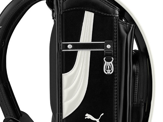 乗せ生地刺しゅうで表現した立体的なフォームストライプ